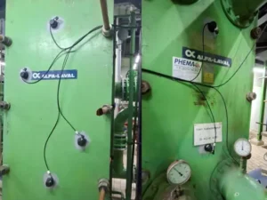 Transducer voor ultrasoon antifouling op een open koelsysteem